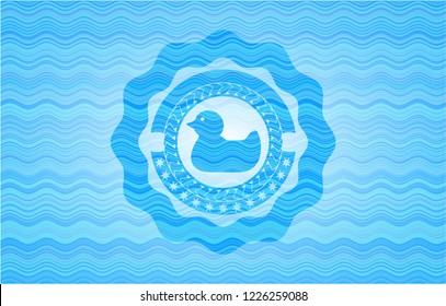 rubber duck icon inside water wave representation emblem background.