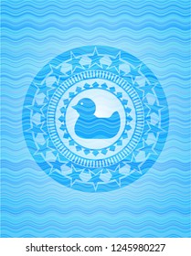 rubber duck icon inside water wave concept badge background.