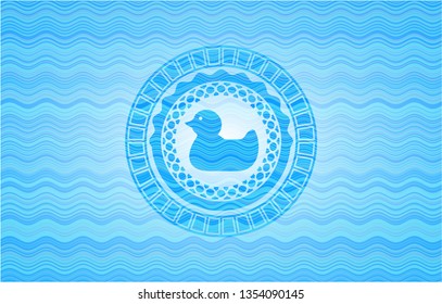 rubber duck icon inside water style emblem.
