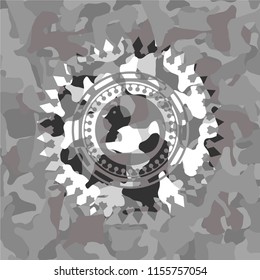 rubber duck icon on grey camouflaged texture