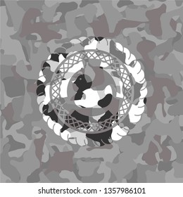 rubber duck icon on grey camo texture