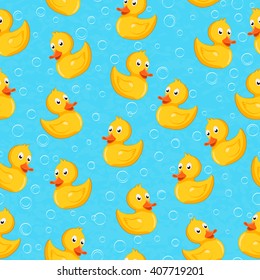 Rubber duck seamless pattern on blue background.