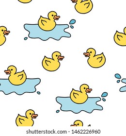 Rubber ducky bath toy. Doodle style seamless texture.