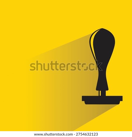 rubber stamper icon with shadow on yellow background