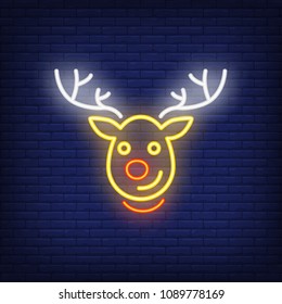 Rudolph neon Christmas reindeer cartoon character. Night bright advertisement element. Neon festive design for New Year, Christmas, celebration, greeting cards