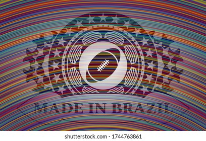 rugby ball icon and Made in Brazil text colorful emblem. Showy fancy background. Illustration. 