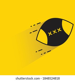 bola de rugby con fondo amarillo oscuro