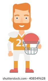 Rugby player with ball and helmet in hands.