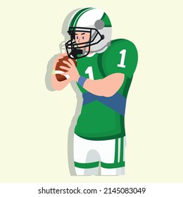 A rugby player in a green t-shirt, white shorts and a protective white helmet holds the ball in his hand, preparing to throw