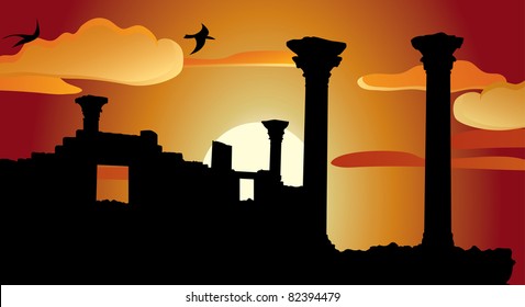 Ruins of antique temple at sunset