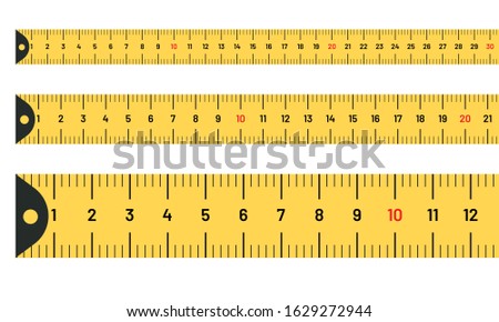 Ruler measuring long tape set. Yellow tape lines with inches and metric centimetres Foto stock © 