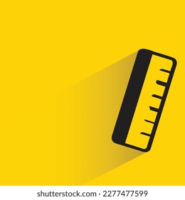 ruler with shadow on yellow background