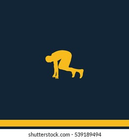 Runner in start position silhouette.