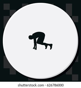Runner in start position silhouette.