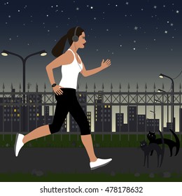 running girl with headphones in sportswear on the background of the city at night. In the background, there are street lights, house, stars in the sky.