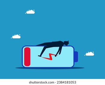 Running out of energy at work. Businessman lying on low battery 
