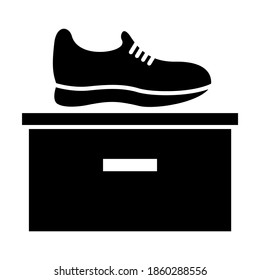 Running shoe icon in trendy silhouette style design. Vector illustration isolated on white background.