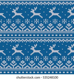 Running white deer in the horizontal knitted ornament on a blue background. Seamless pattern Included in swatches  panel.