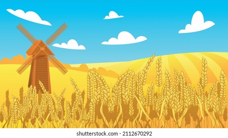 Rural autumn landscape with windmill, blue sky and yellow wheat field with spikelet of rye. 