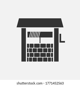 Rural covered water well black and white vector icon.