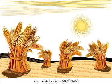 rural landscape with sheaves of ripe wheat