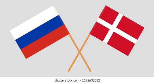 Russia and Denmark. Crossed Russian and Danish flags. Official colors. Correct proportion. Vector illustration