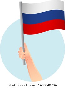russia flag in hand icon
