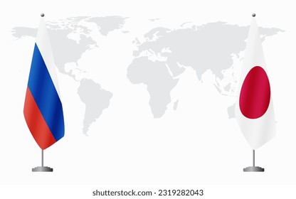Russia and Japan flags for official meeting against background of world map.