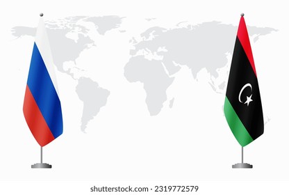 Russia and Libya flags for official meeting against background of world map.