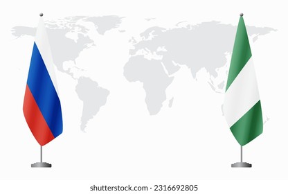 Russia and Nigeria flags for official meeting against background of world map.