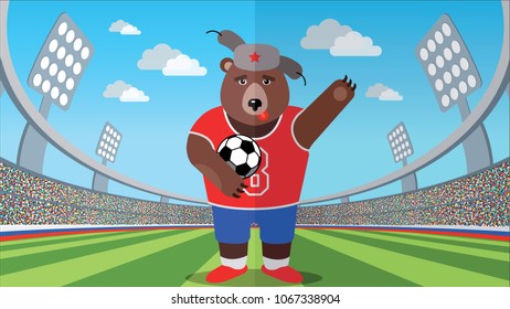 Russian bear with a soccer ball in the stadium