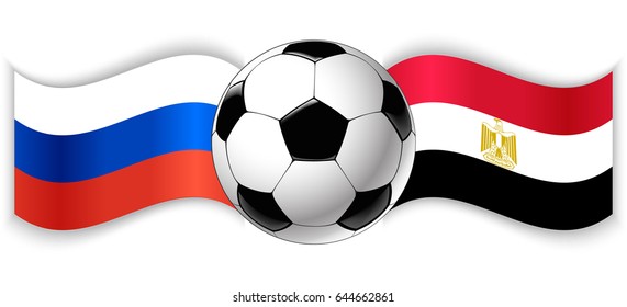 Russian and Egyptian wavy flags with football ball. Russia combined with Egypt isolated on white. Football match or international sport competition concept.