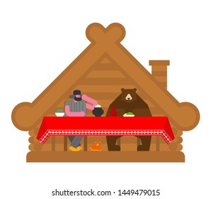 Russian family in home. Bear traditional home animal. Wooden hut 


