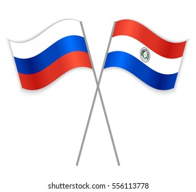 Russian and Paraguayan crossed flags. Russia combined with Paraguay isolated on white. Language learning, international business or travel concept.