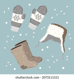 Russian winter clothes - valenki, wool mittens and ushanka hat. Vector set