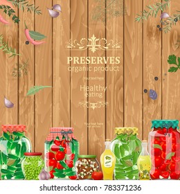 rustic banner with preserving jars of vegetables on wooden background