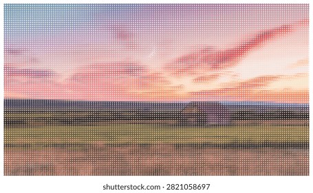 Rustic barn standing alone in vast rural farm field during dramatic colorful sunset sky. Warm pink and orange light illuminates meadow with cloudscape.