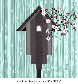 rustic birdhouse over boards 