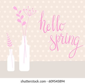 Rustic bottles with abstract flowers background. Hello spring handwritten message. Pink colored.