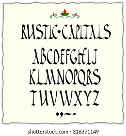 rustic capitals style alphabet square-cut nib black ink calligraphy