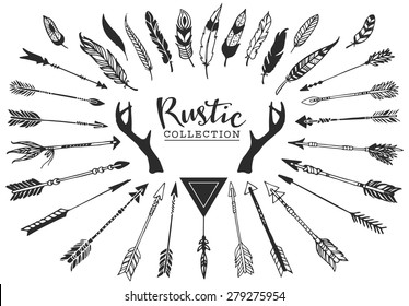 Rustic decorative antlers, arrows and feathers. Hand drawn vintage vector design set.