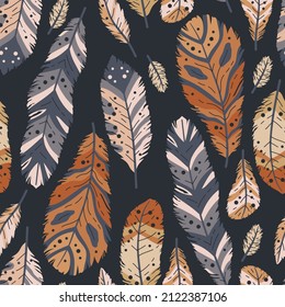 Rustic decorative tribal feathers. Seamless pattern of animals feathers. Decorative ethnic stylize feather ornamental indian aztec design, colored boho hippie birds background