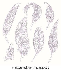 Rustic Ethnic decorative feathers. Hand drawn vintage vector design set. Black and white ink sketch illustration. Vintage Tribal and Decorative zentangle feathers.