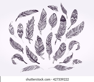 Rustic Ethnic decorative feathers. Hand drawn vintage vector design set. Black and white ink sketch illustration. Vintage Tribal and Decorative feathers.