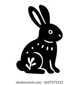 Rustic style figurine with a hare. Ethnic sticker. Bohemian animal silhouettes and floral patterns on Scandinavian style textiles. Handmade relief image of a hare in the style of linocut.