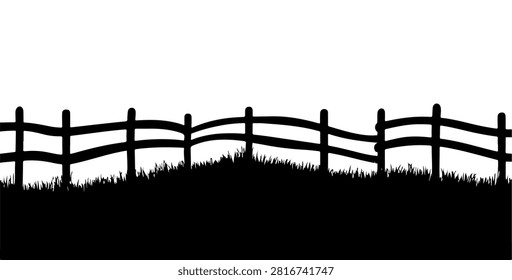 A rustic wooden fence with grass in the foreground, creating a natural rural landscape scene suitable for outdoor or countryside themes.