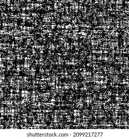 Rustic wool fabric woven with black and white thread. Grunge structure background.