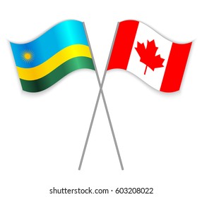 Rwandan and Canadian crossed flags. Rwanda combined with Canada isolated on white. Language learning, international business or travel concept.