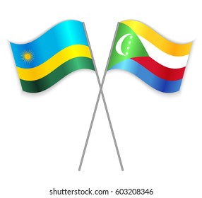 Rwandan and Comoran crossed flags. Rwanda combined with Comoros isolated on white. Language learning, international business or travel concept.