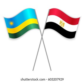 Rwandan and Egyptian crossed flags. Rwanda combined with Egypt isolated on white. Language learning, international business or travel concept.
